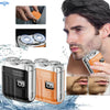Portable electric shaver in black and orange colors shown with a hand using it to trim facial hair.