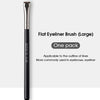 A black flat eyeliner brush is shown standing vertically against a white background.