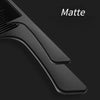 A close-up view of a matte black multifunctional hair detangler comb brush set.
