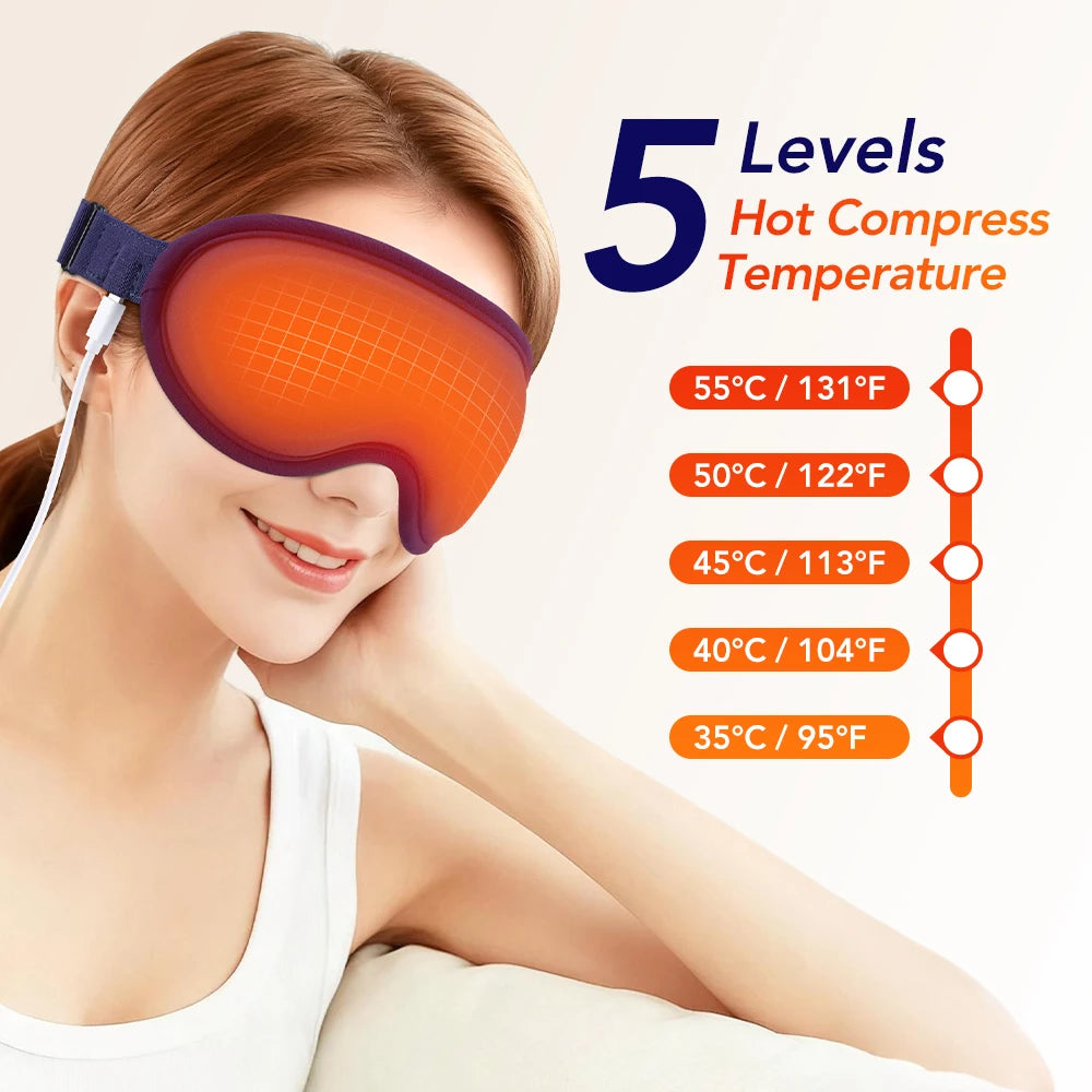 A woman is wearing an orange heated eye mask on her eye while relaxing.