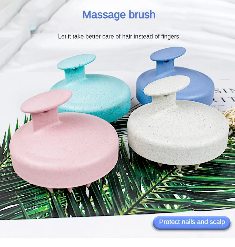 Three silicone massage brushes in pink, light blue, and purple are shown on a green leaf background.