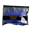 A black pouch containing a blue African bath sponge for refreshing and exfoliating the body.