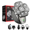 A grooming kit featuring a 6-in-1 electric head shaver with multiple attachments and a box.