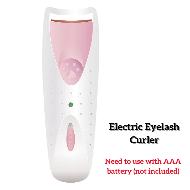A white electric eyelash curler device with a pink interior and a green indicator light.