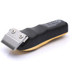 A black and gold professional LCD hair clipper set with a metal comb attachment.