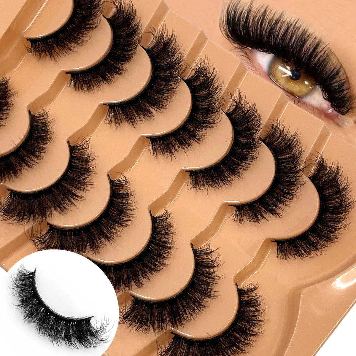 Une palette de faux cils bruns dans divers styles et longueurs.