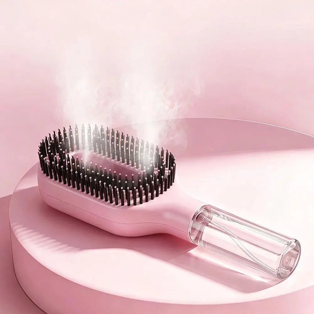 A pink 2-in-1 hair styling comb and moisturizing spray is shown with steam rising above it on a light pink surface.