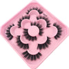 A pink tray holding a set of black artificial mink eyelashes for eye extensions.