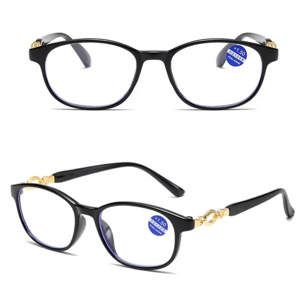 A pair of black progressive multifocal reading glasses with gold accents shown against a white background.