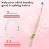 A pink electric toothbrush for kids with a dinosaur design, shown next to a clock face illustrating brushing timing.