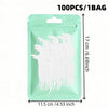 A package containing 100 reusable white dental floss picks in a light green pouch.