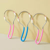 Three precision facial hair removal tools in pink and blue colors displayed on a light background.