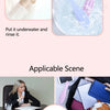 Silicone gua sha roller in purple and pink colors being used for facial massage and skincare.