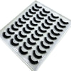 Plateau en plastique contenant un ensemble de faux cils de renard naturels pour application.
