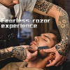 A man is receiving a fearless razor experience with a professional straight edge barber razor.
