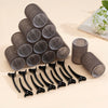A set of metallic hair rollers for heatless curls and volume, shown in various sizes and angles.
