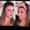 A woman shows off a facial lifting band with adjustable straps used for anti-wrinkle support on her hair.