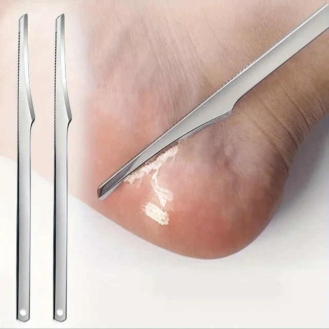 A set of multi-piece stainless steel foot care tools shown next to a human foot.