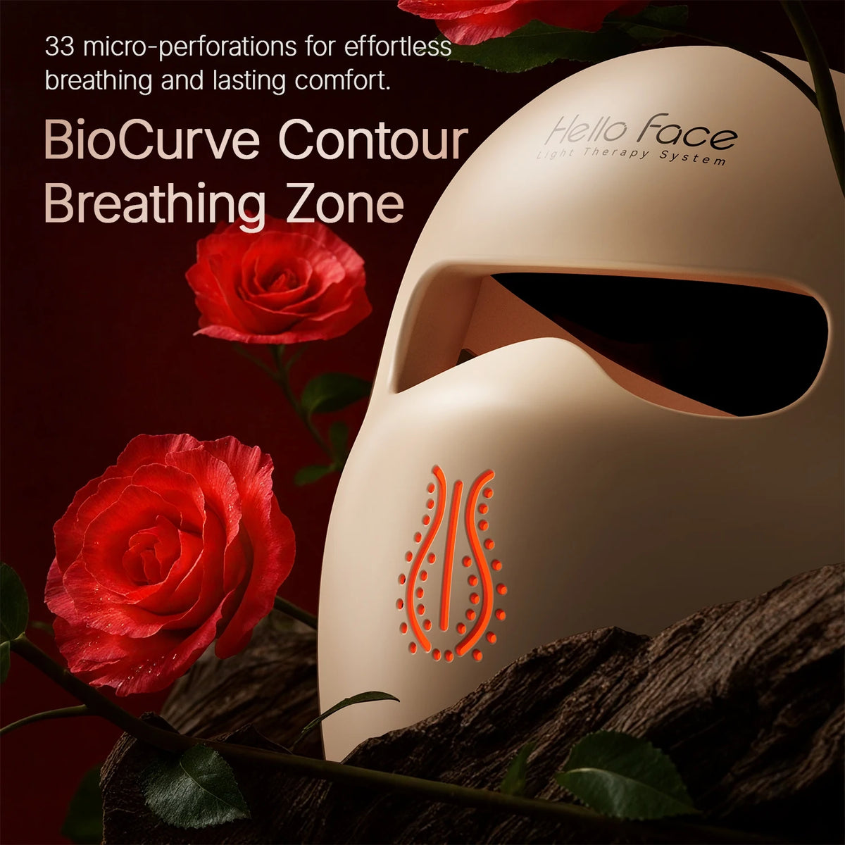 A beige light therapy mask with micro-perforations is shown next to red roses and dark wood.