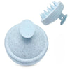 Light blue silicone scalp massage and body brush with a textured head and base.
