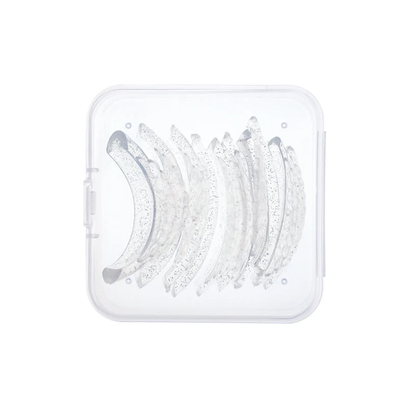Pads en silicone transparents pour recourbeuses de cils.