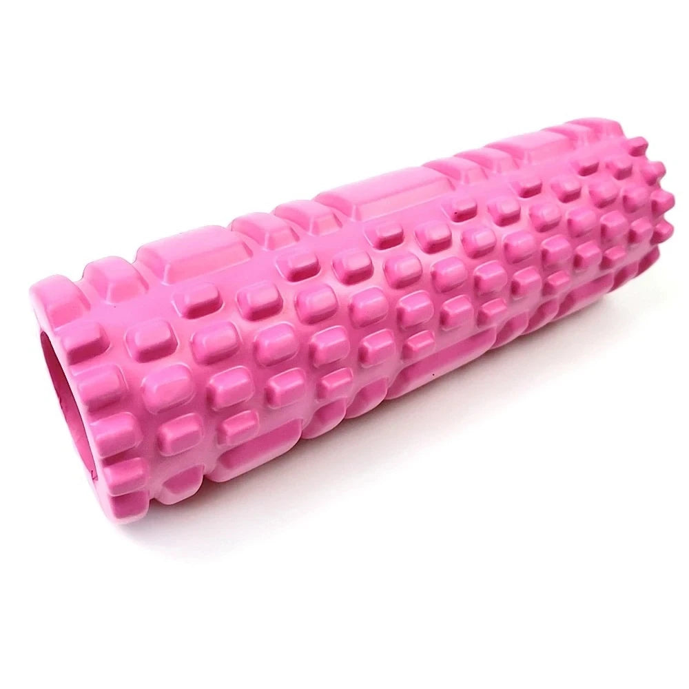 A pink fitness foam roller for muscle recovery shown in a diagonal view.