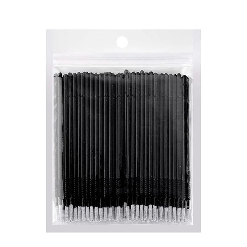 A clear plastic package containing a set of disposable micro brushes for eyelash extensions.