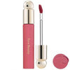 A tube of liquid bronzer contour foundation stick in pink packaging with a brush applicator.