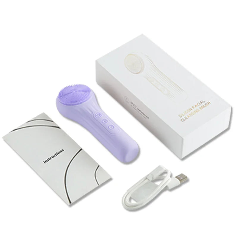 A white box and a purple silicone facial cleansing brush with a charging cable are shown.