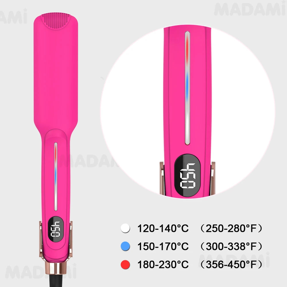 A pink infrared hair straightener with a metallic finish and temperature indicators.