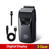 A black portable electric shaver with a digital display showing 99% power left and three included gears.