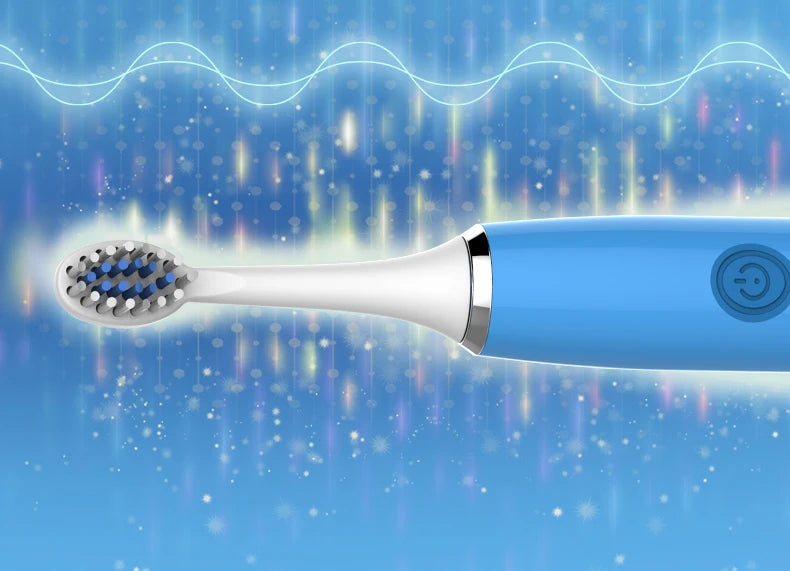 A blue electric toothbrush with a replacement head is shown against a bright, sparkling background.
