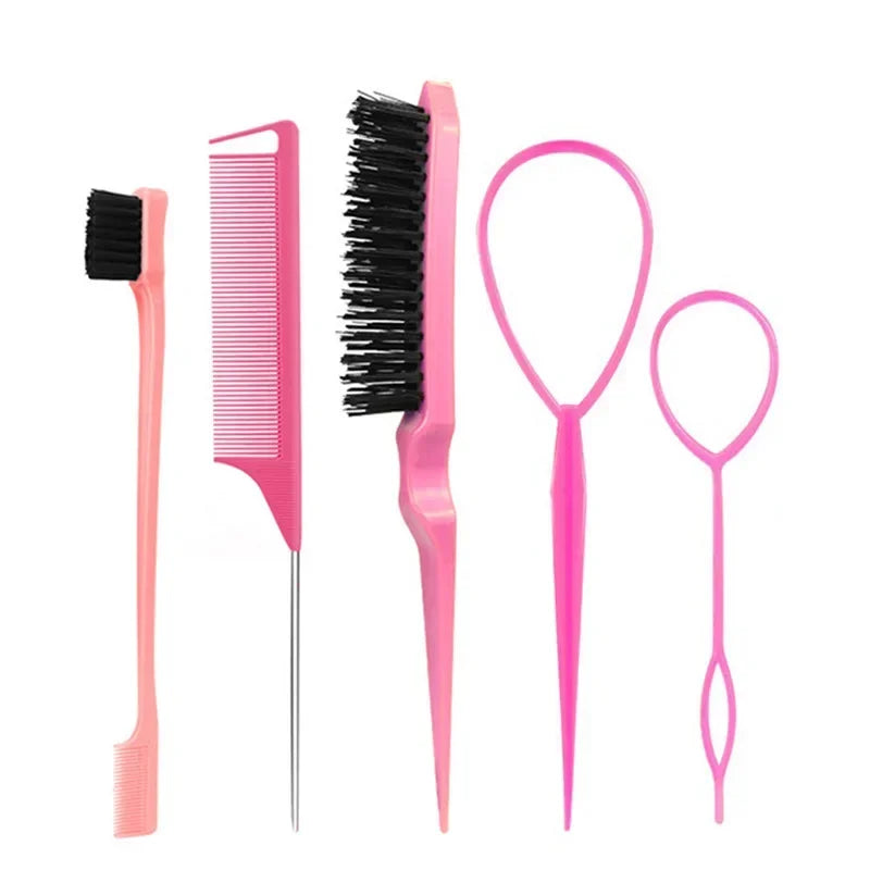 A set of pink hair styling tools including a comb, brush, and pick