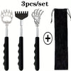 A set of three stainless steel telescopic back scratchers with black handles and a matching travel pouch.