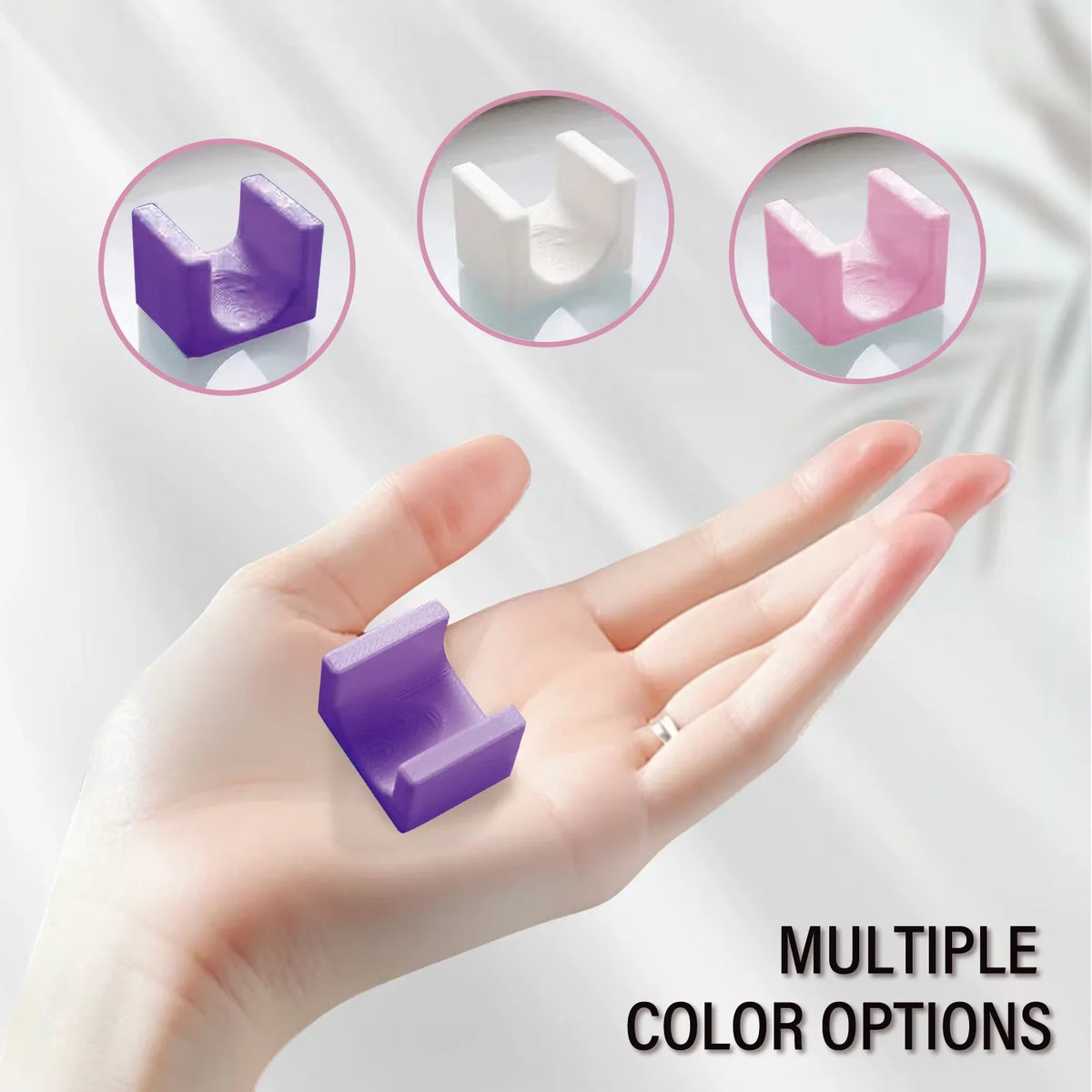 A hand holds a purple 5D cat eye magnet tool for nail art, showing multiple color options.
