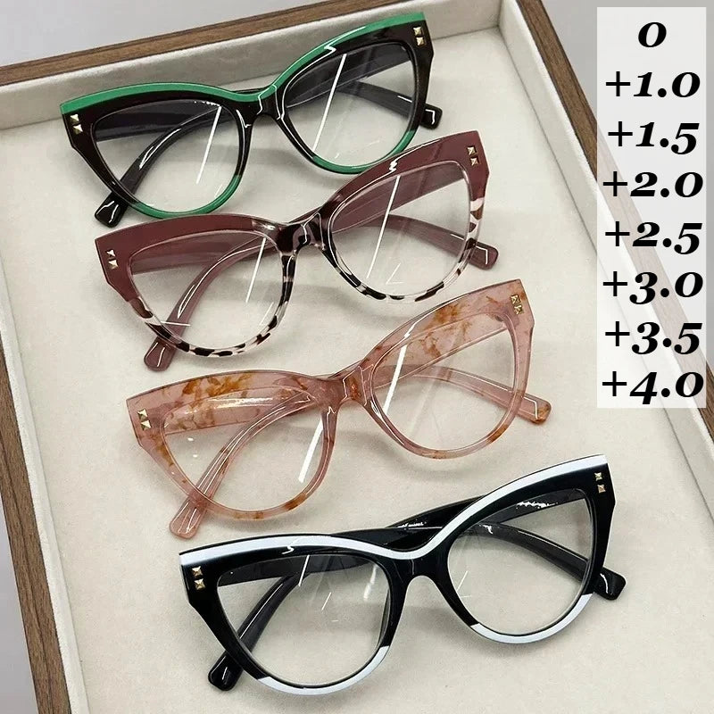 Collection de cinq paires de lunettes à œil de chat tendance dans diverses nuances de brun, vert et noir