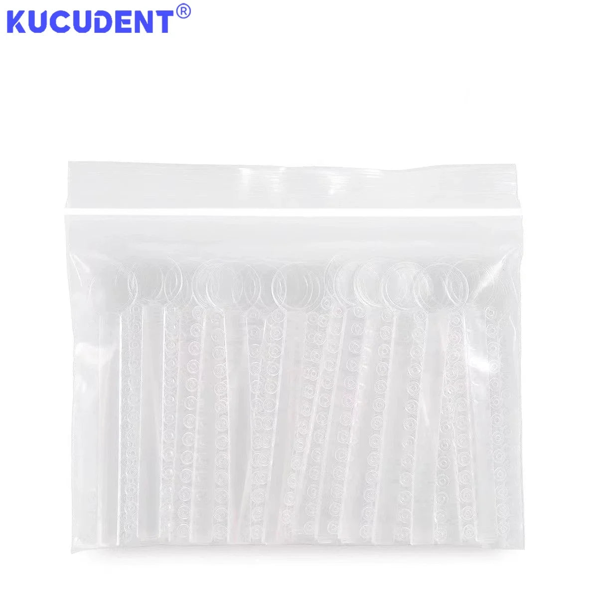 A clear plastic bag containing orthodontic elastic ligature ties for braces.