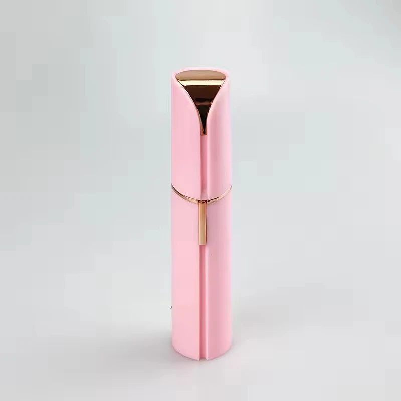 A pink electric facial hair remover with a gold accent, shown vertically.