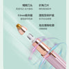 A close-up of a pink electric eyebrow trimmer with a gold-tipped head and a clear protective cap.
