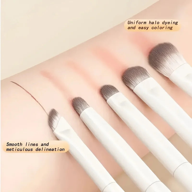 A set of five professional makeup brushes demonstrating uniform halo dyeing and smooth delineation on skin.