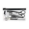 Un set d'outils professionnels pour tailler et modeler les sourcils, comprenant des pinces, des ciseaux et un rasoir, présent