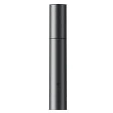 A sleek, cylindrical electric hair trimmer with a silver finish shown vertically against a black background.