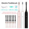 A set of pink, white, and black electric toothbrushes with charging cables and various brush heads shown for sale.