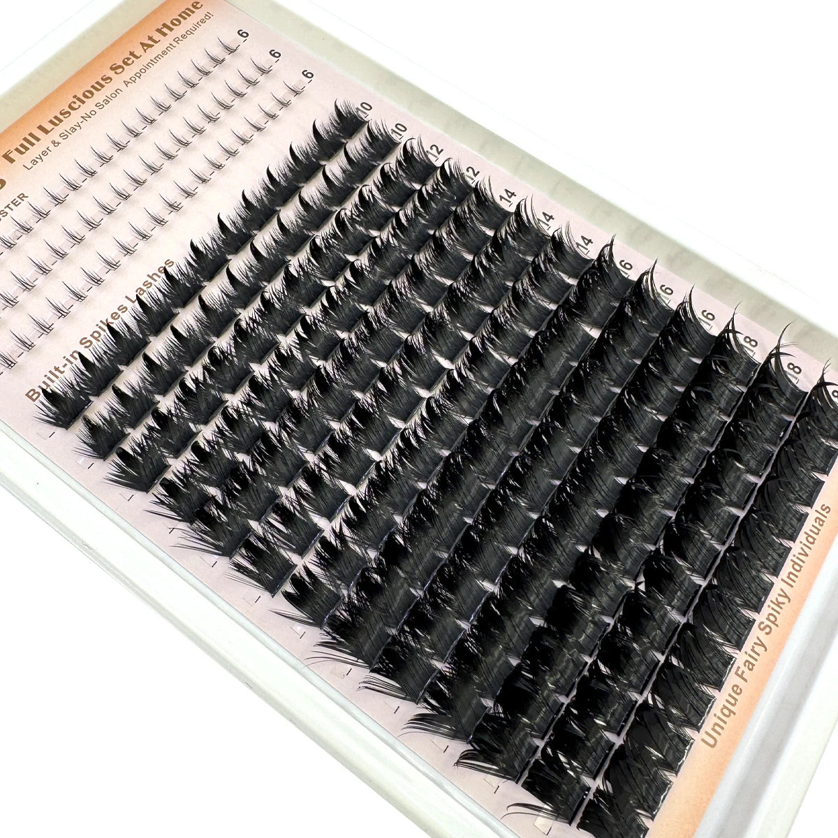 Présentation de clusters de cils pointus DIY pour extensions de salon, montrant divers styles et longueurs.