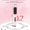 A pink infrared heated round brush with a black grille shown against various voltage symbols and country icons.