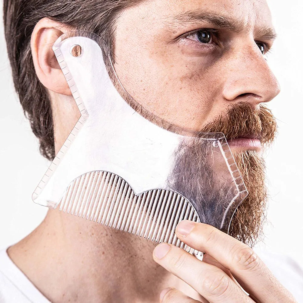 A man is holding a clear plastic beard shaping tool against his face to style his beard.