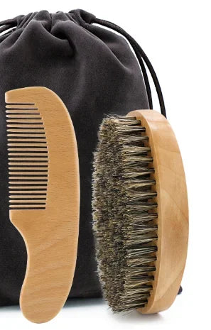 A wooden boar bristle beard brush and comb set with a black fabric gift bag.