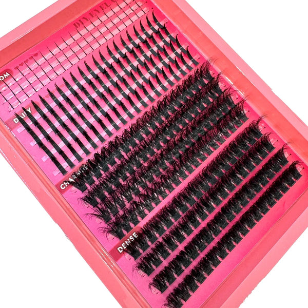 A pink box displaying various lash clusters for DIY eyelash extensions, including thin, short, and dense styles.