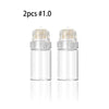 A set of two clear glass microneedling stamps with metal needles inside