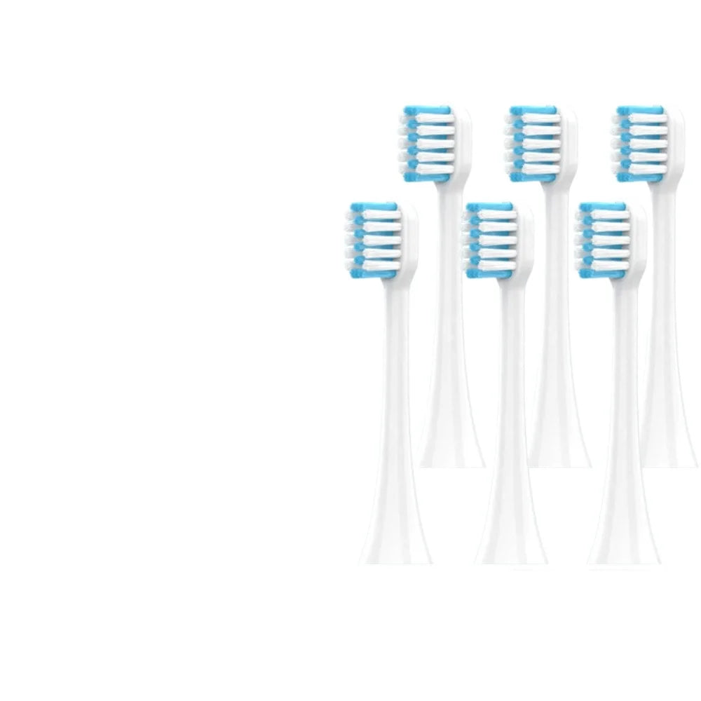 Eight replacement silicone toothbrush heads in blue and white packaging.